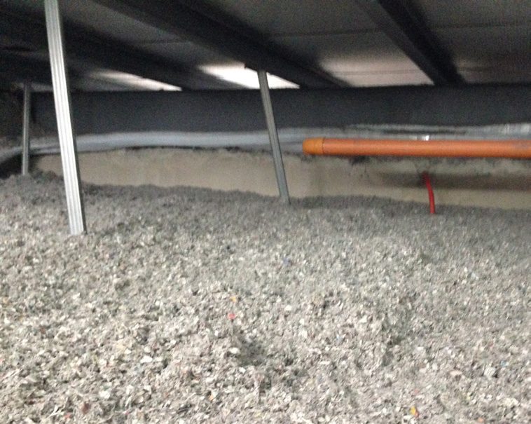 Cellulose insulation installed in a roof space